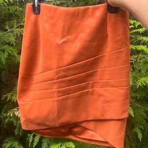 NWOT Guess faux leather orange mini skirt (size M)